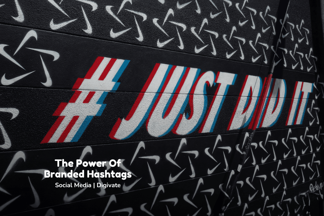 A graffiti wall shows the branded hashtag #justdidit from the brand Nike, which is known for building social media buzz.