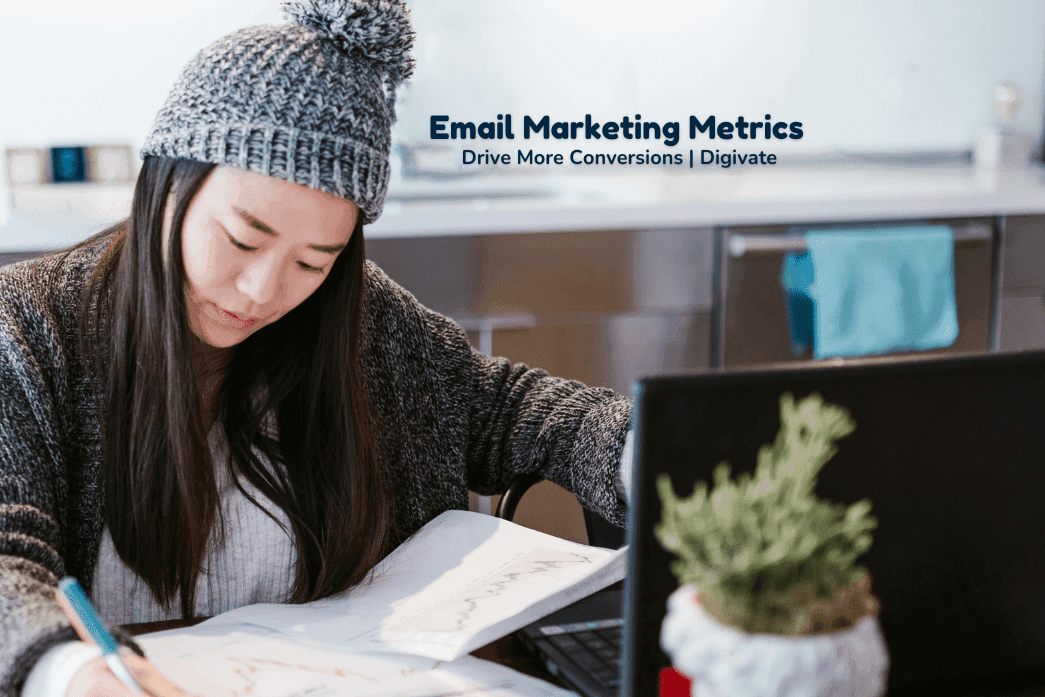 a woman wearing a beanie writing on a page full of graphs