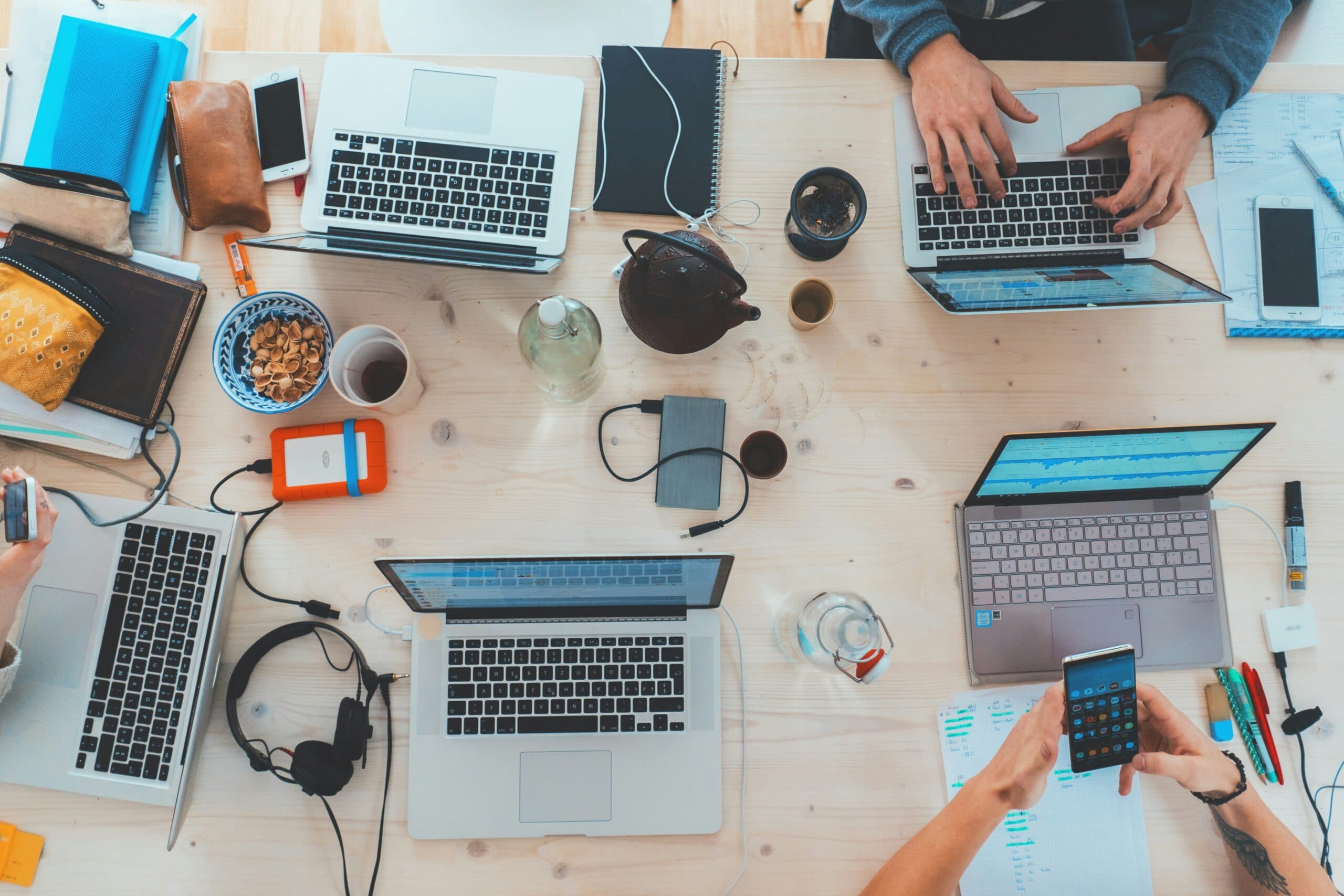 birds eye view of people working on laptops