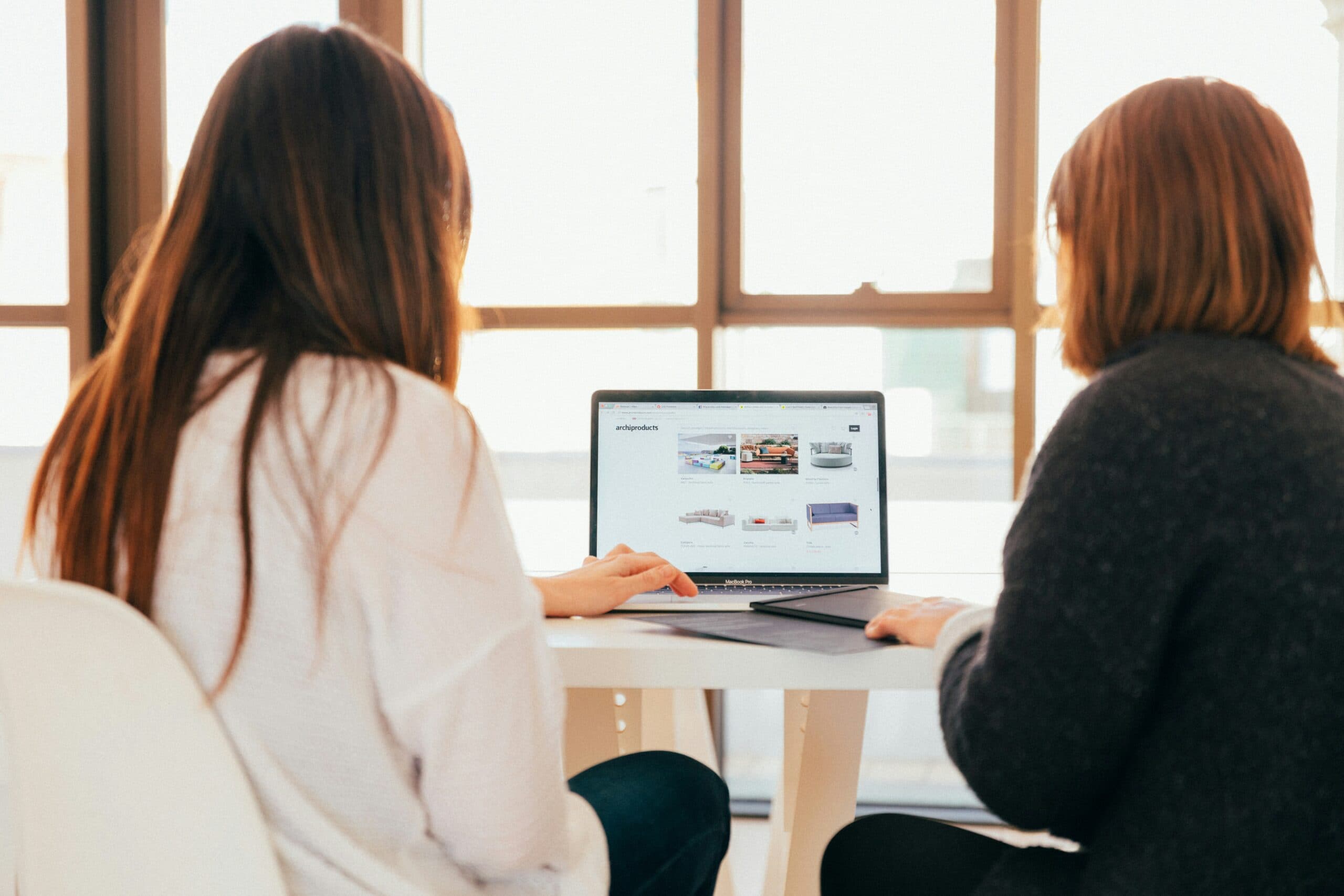 People looking at a website