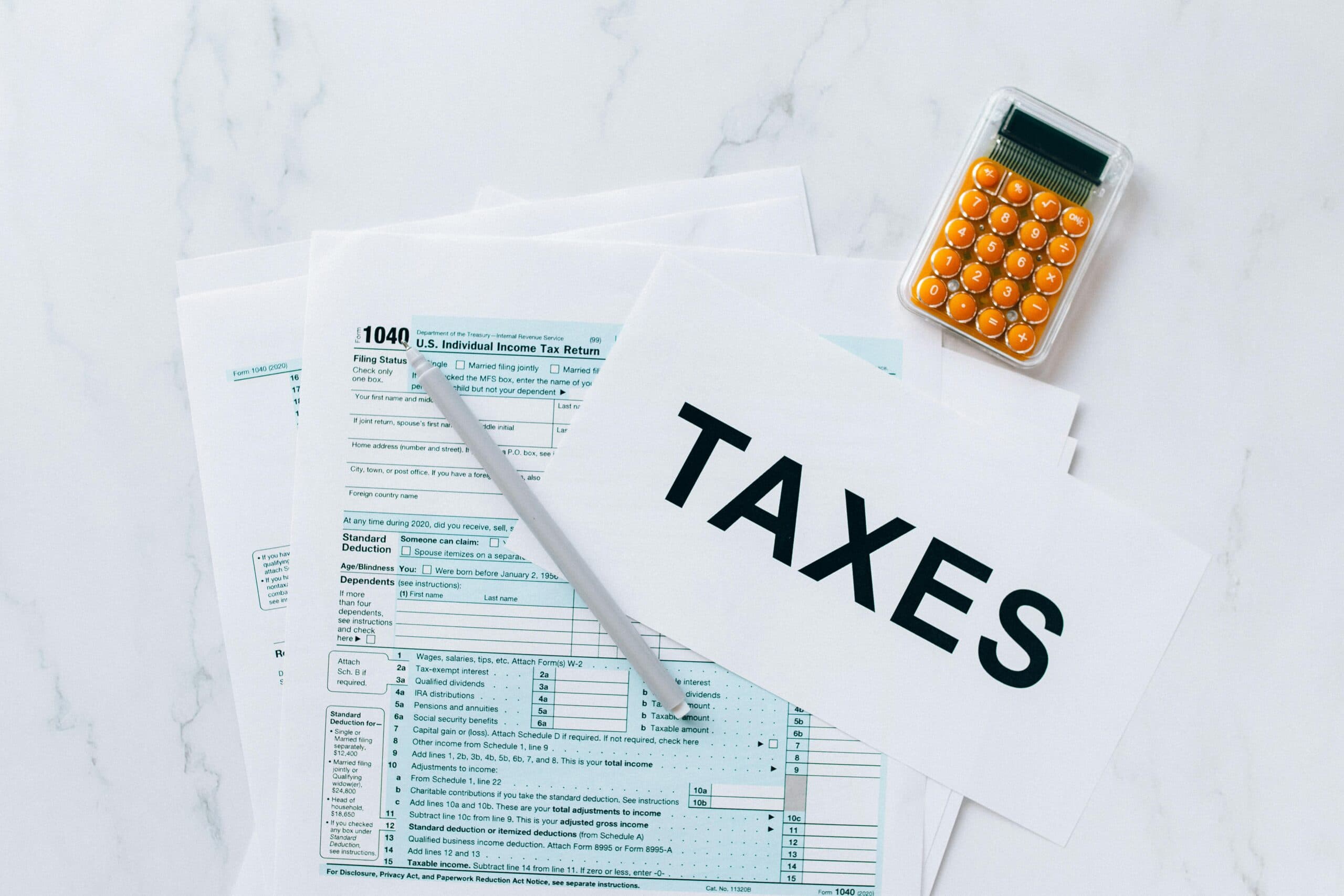 tax papers and calculator
