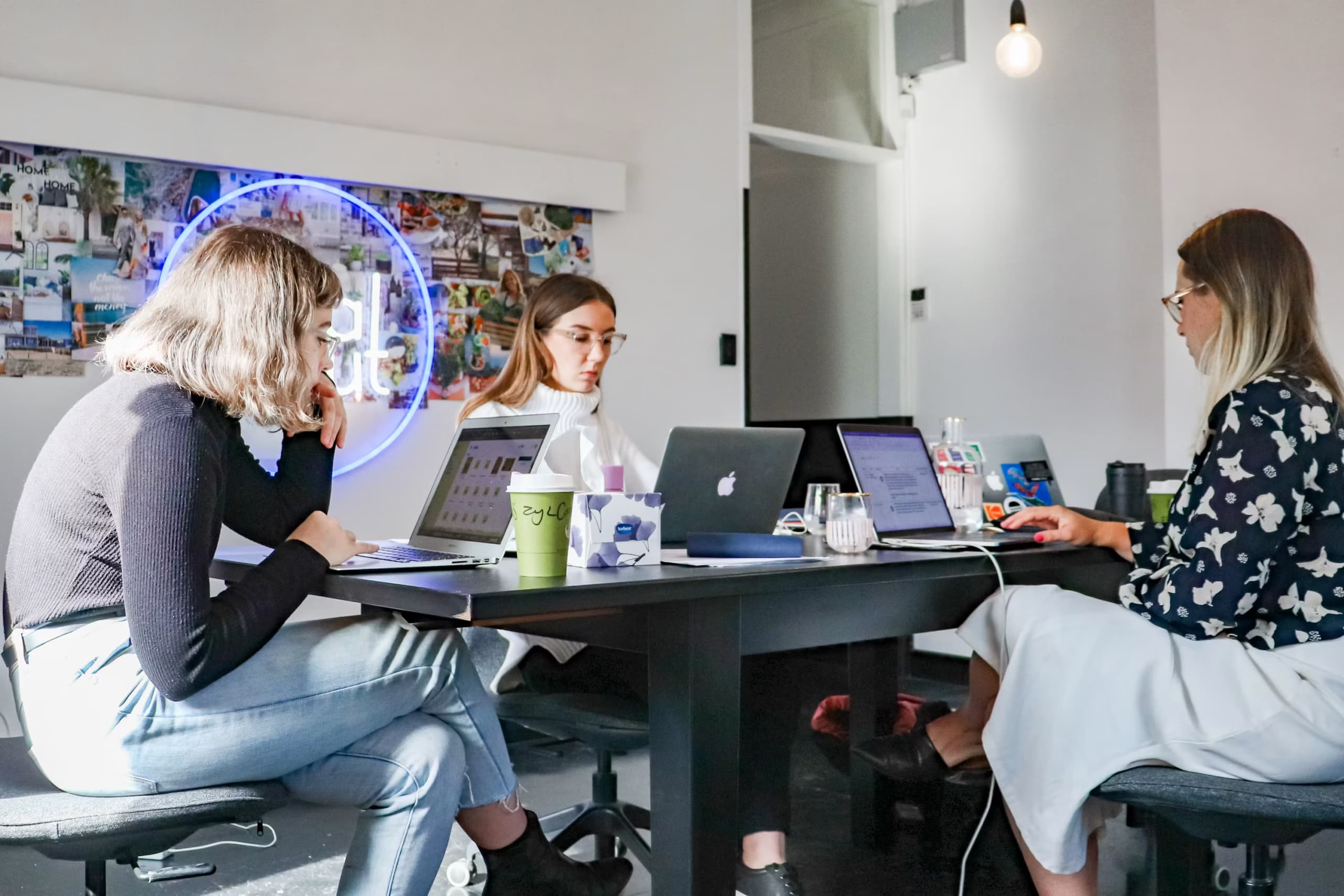 Marketing team working together in a bright, colourful office