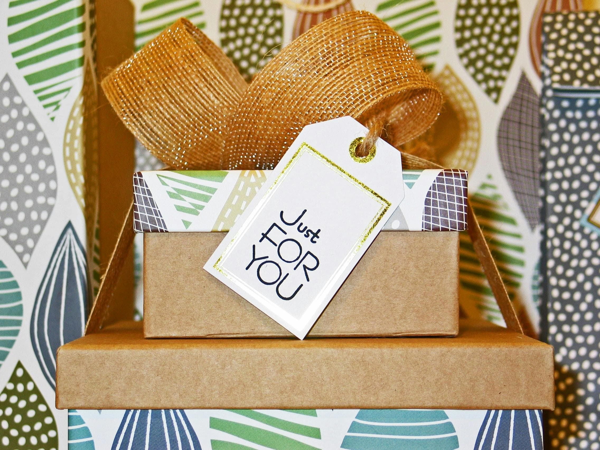 gift boxes in a package with a tag saying just for you