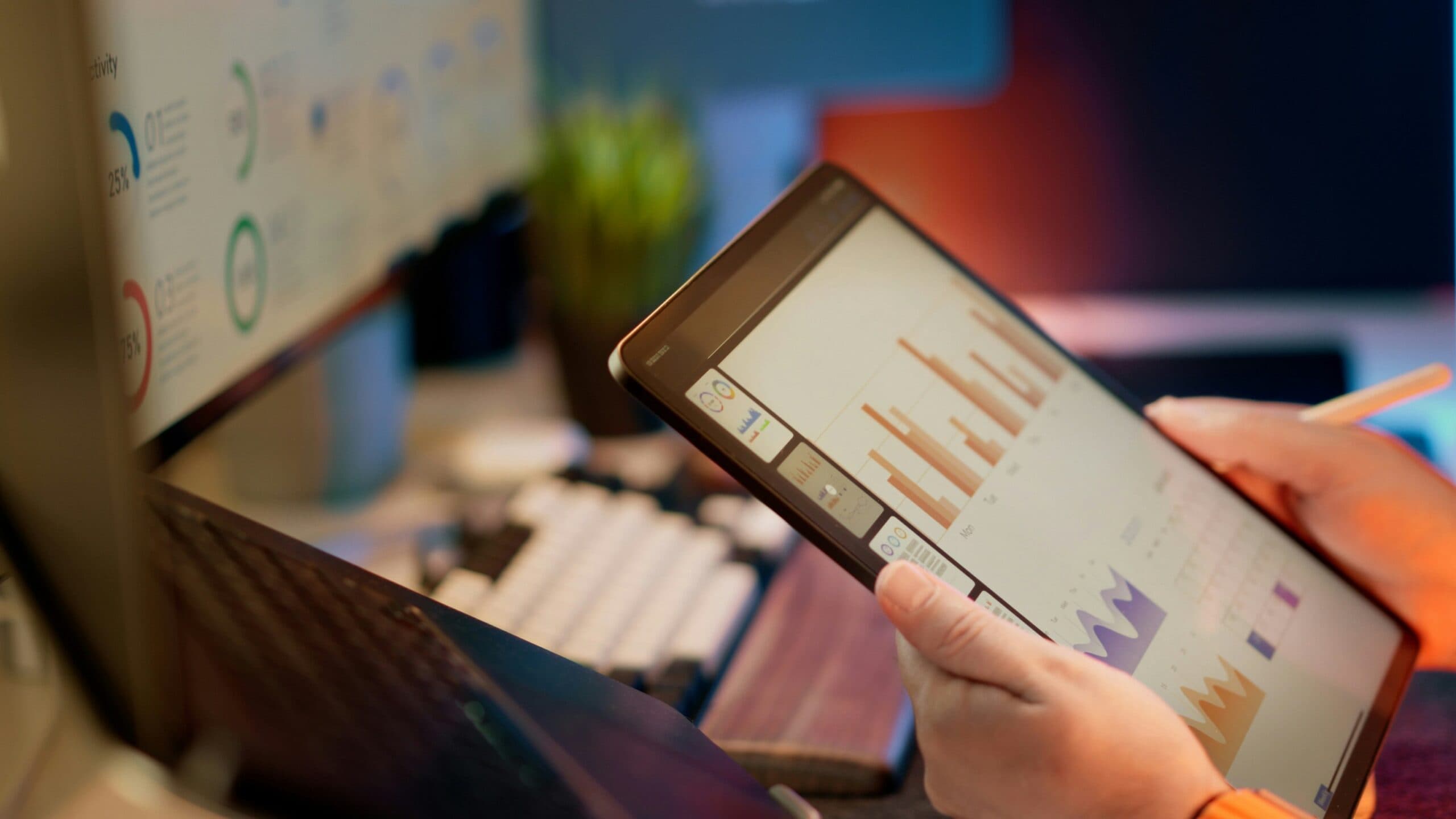 Marketing analytics dashboard showing performance graphs on a laptop screen.
