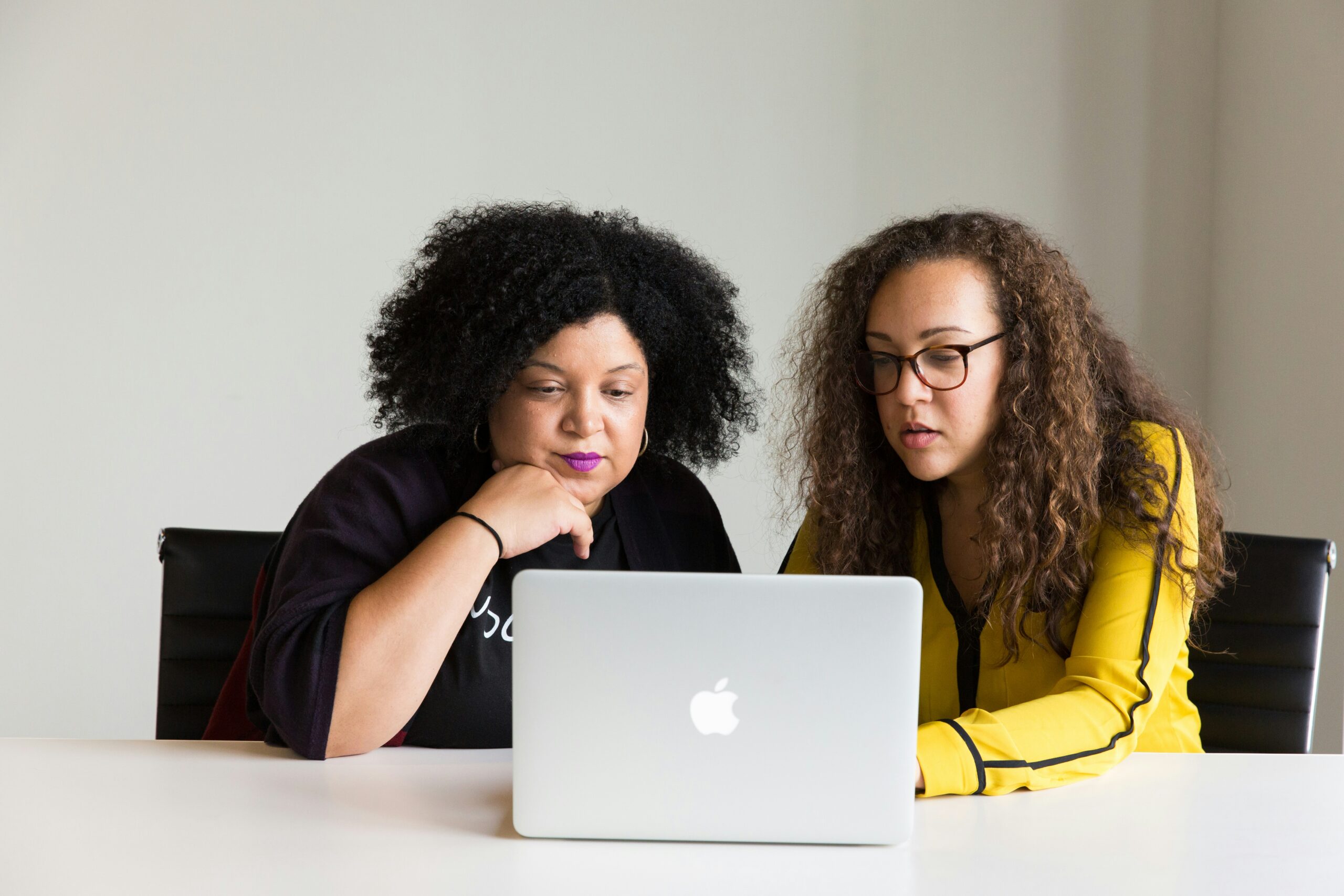 women-looking-at-laptop