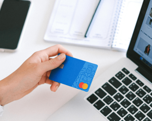 online_shopping_hand holding a generic bank card